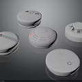 Multiple White Round Electronic Smoke Detectors With Indicator Lights For Home Safety