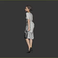 Woman Lifting Patterned Dress Standing With High Heels On Gray Background