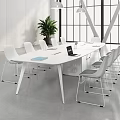 Modern White Conference Table With Laptop Documents And White Chairs In Bright Office