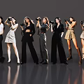 Women with cameras standing in a line with various outfits on gray background