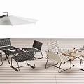 Outdoor Patio Dining Set With Woven Chairs And Metal Frame Umbrella On Wooden Deck