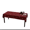Christmas Dinnerware Set with Red Tablecloth Snowflake Patterns Plates Forks Glassware and Floral Decorations