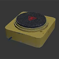 Yellow Square Base Electrical Heating Plate With Black Circular Panel And Red Triangular Warning Sign