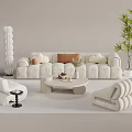 Modern White Upholstered Sofa And Coffee Table Combination With Pillows Potted Plant And Accent Chairs