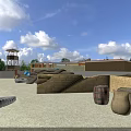 Outdoor Military Training Ground Featuring Watchtower Brick Walls Tires Barrels And Gravel Surface