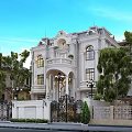 European Detached Villa With White Exterior Balcony Arched Windows Wrought Iron Gate And Surrounding Greenery