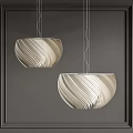Two Modern Striped Pendant Lights Hanging On Dark Wall Interior Design