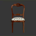 Elegant Wooden Stool With Carved Backrest And Floral Patterned Upholstered Seat