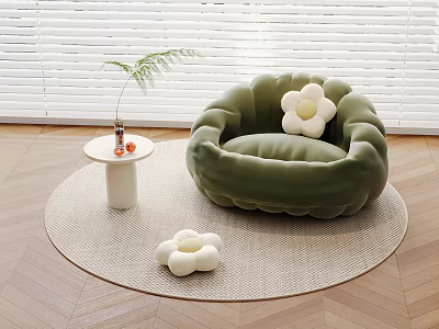 Green Pleated Bean Bag Chair On Round Rug With White Flower Decor And Side Table 3d model