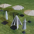 Outdoor Sunshade Umbrellas on Green Grass Various Designs Beige Gray Striped Black Base Stands