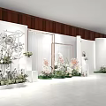 2023 International Beauty Expo NF Brand White Curved Booth With Green Plants And Floral Decor