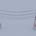 Red And White Steel Electricity Transmission Towers With Multiple Power Lines Against Clear Sky