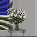 Fresh White Roses Floral Arrangement In Glass Vase On Round Table By White Window Blinds