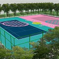 School Outdoor Tennis Courts With Blue Pink Surfaces And Tennis Racket Design
