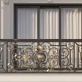 Ornate Balcony Railing with Intricate Iron Design and Gold Decorative Accents