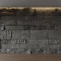 Textured Gray Stone Accent Wall With Warm Overhead Lighting In Modern Interior 3d model