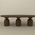 Modern Brown Coffee Table with Minimalist Design and Three Cylindrical Legs 3d model