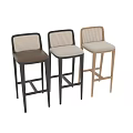 Modern Bar Stools With Light Wood Frames Woven Seats And Black Legs