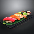 Assorted Fresh Sushi with Tuna Salmon Avocado on Black Slate Plate with Green Leaf