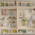 Wooden Display Shelves With Assorted Children's Toys Clothes Dinosaurs Dolls Hats And Books