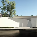 Modern Entrance Gate Featuring White Walls Curved Roof Green Trees and Person Under Blue Sky