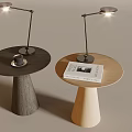 Two Round Side Tables With Desk Lamps Coffee Cup And Book