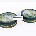 Decorative Ornament Set Featuring Two Circular Green Boxes With Palm Tree Patterns