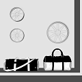 Black And White Luggage Bags Displayed With Hanging Wheels In Modern Interior