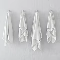 White Soft Towels Hanging On Wall Hooks In Modern Bathroom 3d model