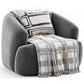Cozy Beige Single Sofa With Striped Pillow Plaid Throw Blanket And Matching Ottoman
