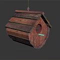 Handmade Wooden Birdhouse With Reddish Brown Layered Roof And Circular Entrance