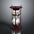 Red Wooden Frame Hourglass With Silver Glass Bulbs And Reflection Base