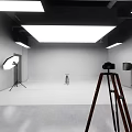 Modern Retail Space Interior With Red Sofa Chairs Small Tables And Clothes Racks