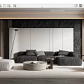 Modern Living Room Interior Design With Gray Sofa Round Coffee Table And Dark Accent Wall