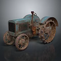 Vintage Tractor With Rustic Blue Green Finish And Large Spiked Wheels