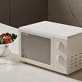 Modern Kitchen Countertop With White Microwave And Bowl Of Fresh Vegetable Salad