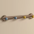 Bone Shaped Wooden Wall Hook With Four Colorful Blue And Yellow Balls