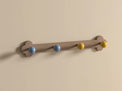 Bone Shaped Wooden Wall Hook With Four Colorful Blue And Yellow Balls 3d model