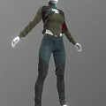 Model Wearing Green Long Sleeve Top With Blue Detail And Blue Jeans Against Gray Background