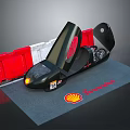 Black Racing Car With Number 10 Red Barrier Shell Pirelli Logos And Gray Mat