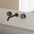 Modern Wall Mounted Matte Black Faucet With Minimalist Design On White Wall