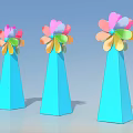 Three Colorful Petal Shaped Architectural Components With Blue Conical Bases