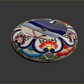 Colorful Circular Carved Sculpture With Floral Patterns And Blue Decorative Lid