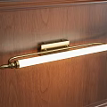 Classic Brass Wall Lamp Mounted on Wooden Panel with White Light Tube