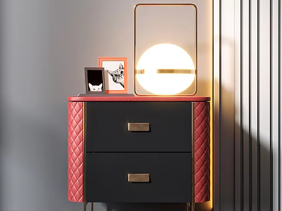 Stylish Nightstand With Red Quilted Sides Two Drawers Gold Handles Round Lamp And Photo Frames On Top 3d model