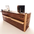 Solid Wooden Reception Desk With Two Computer Monitors And Light Wood Handles