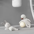 White Stuffed Doll In Kids Playroom With Spiral Staircase Punching Bag And Balls