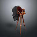 Vintage Electronic Camera Design With Wooden Tripod And Cloth Cover