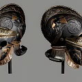 Two Ancient Helmets With Black Base Gold Accents And Intricate Carved Patterns