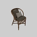 Handwoven Natural Rattan Armchair With Soft Grey Fabric Cushions And Textured Decorative Throw Pillow